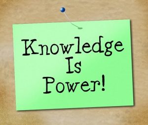 "Knowledge is Power" Written on Note Paper